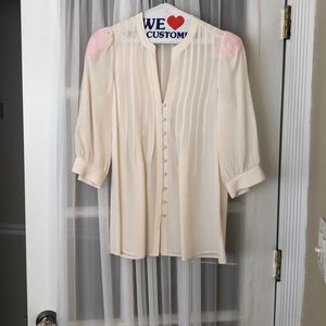 Cream colored blouse